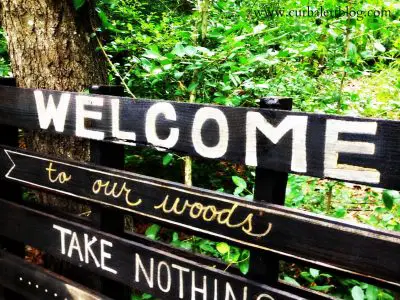 Welcome to our woods sign