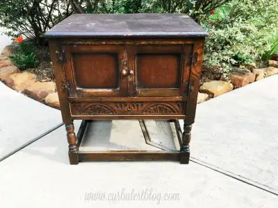 My future farmhouse end table find at the curb